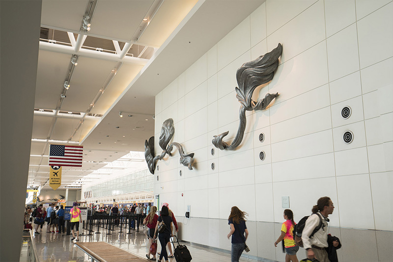 Wall sculpture near security line