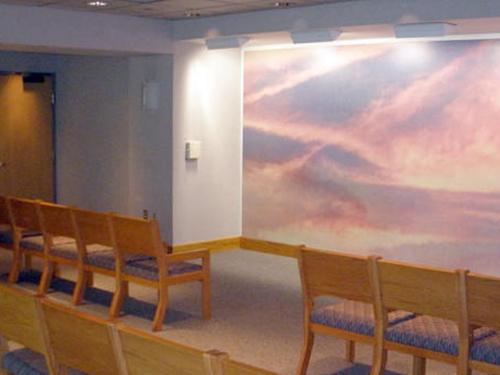 meditation room chairs and serene image on the wall